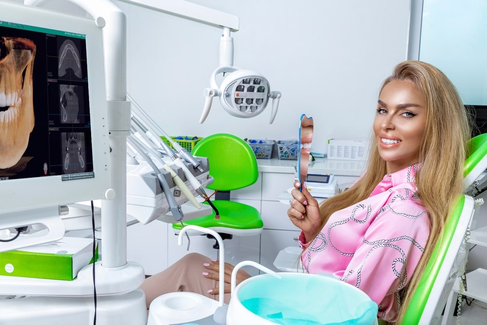 Beautiful woman smiling in her porcelain veneers